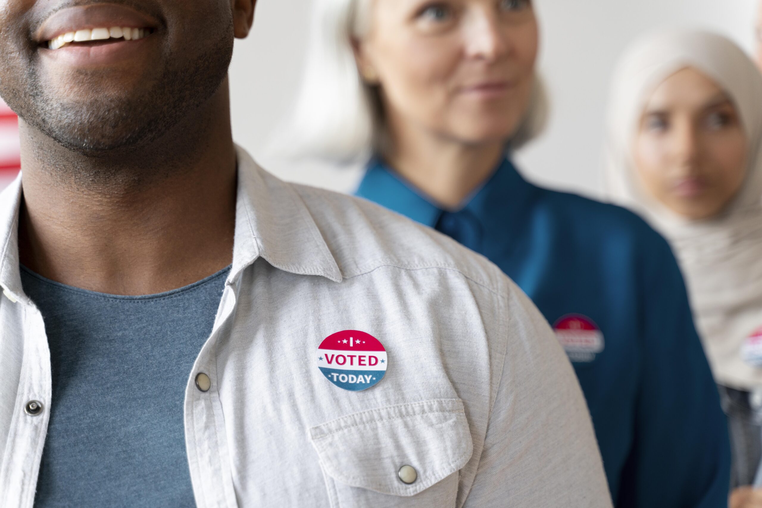 group of diverse people voting